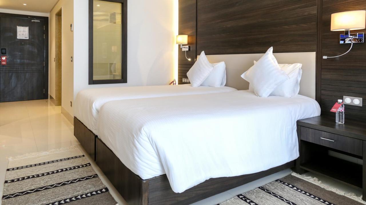 Radisson Hotel Сфакс Екстериор снимка A bedroom at the hotel